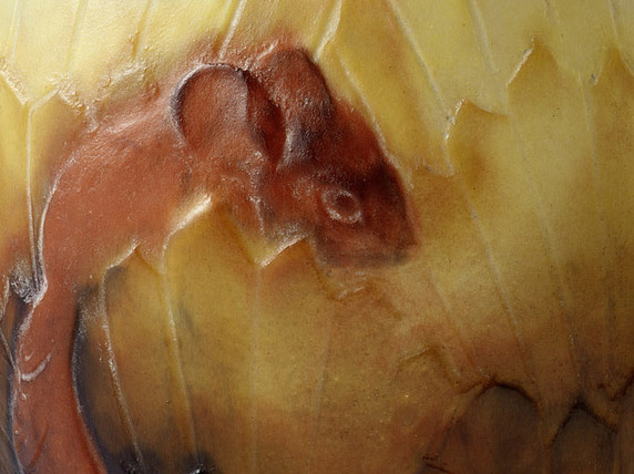 Vase with squirrels